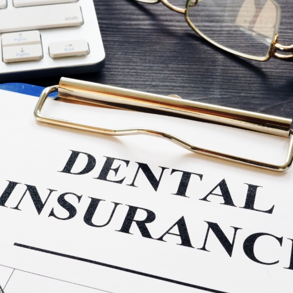 insurance paperwork on clipboard